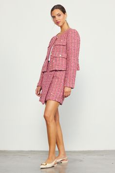 This tweed jacket offers a classic design in shades of pink with multicolor accents. Boxy and highly textured, the style has flap pockets, embossed gold-tone buttons, and padded shoulders for a bit of structure. Style yours with our matching miniskirt for a coordinated set, or take the look casual with denim. •Round neckline •Flap pockets •Button closures •Padded shoulders •Long sleeves •Boxy fit Item Number: 25789 100% POLYESTER Pink Tweed Jacket With Buttons For Fall, Pink Tweed Workwear Jacket With Buttons, Chic Pink Tweed Blazer, Formal Pink Tweed Blazer, Pink Tweed Jacket For Office, Pink Tweed Office Jacket, Elegant Pink Tweed Outerwear, Pink Single-breasted Tweed Jacket, Chic Pink Tweed Jacket For Formal Occasions