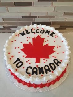 a cake with the words welcome to canada on it