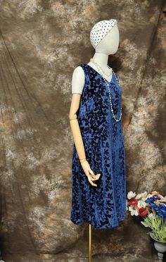 1920's style drop waist dress, made of dark blue silk floral velvet and lined in 100% silk.  You can wear with other vintage coat. Suitable for swing and vintage event. It's a original design dress, not a vintage. Necklace is not included.  We only have one in stock, size: S-M  (Reference Breast size: 80-88cm  Hip: 88-98cm) Please understand we don't accept return for this item. Vintage 1920’s Dresses, Vintage Drop Waist Dress, Downton Abbey Dress, 1920s Drop Waist Dress, Vintage 1920s Dress Sleeveless, Downton Abbey Dresses, Vintage V-neck Flapper Dress For Evening, 1920's Style, Drop Waist Dress