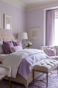 a bedroom with purple walls and white bedding, lavender curtains, an upholstered chaise