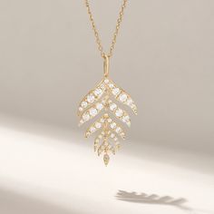 ✥ Surprise her with our Round Cut Diamond Leaf Pendant Necklace, a gift that embodies elegance and nature's beauty. This exquisite piece features a delicate leaf-shaped pendant adorned with sparkling round cut diamonds, symbolizing growth and renewal. Perfect for any occasion, from daily wear to special celebrations, this necklace adds a touch of sophistication and charm to her ensemble. Crafted with meticulous attention from high-quality materials, it ensures lasting beauty and durability. An i Gold Leaf Pendant, Nature Necklace, Surprise Her, Man Made Diamonds, Jewelry Images, Women Necklace, Floral Necklace, Rose Gold Metal, Leaf Pendant