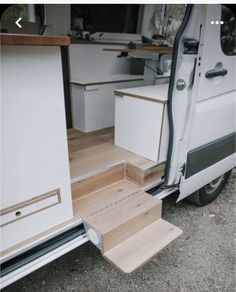 the stairs are made out of plywood and have been built into the side of the van