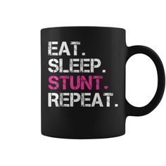 a black coffee mug with the words eat sleep stunt repeat in pink and white letters