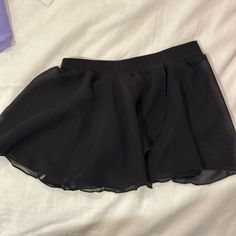 Black Polyester Ballet Skirt. Nwot. Kids Size Small. Black Mini Skirt Skort For Cheerleading, Black Mini Skirt For Cheerleading, Black Stretch Skirt For Cheerleading, Casual Black Skort, Stretch Black Dancewear Bottoms, Black Stretch Dancewear Bottoms, Stretch Black Bottoms For Dancewear, Black Stretch Bottoms For Dancewear, Stretch Mini Skort For Dance