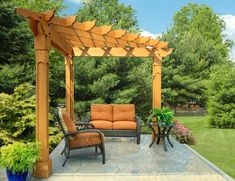 an outdoor living area with furniture and plants