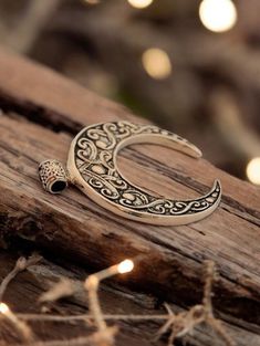 Embrace the mystical charm of our Silver Crescent Necklace, a Slavic amulet featuring a large Lunula moon symbol. This pagan necklace is a powerful witch amulet, symbolizing protection, femininity, and the cycles of the moon. Perfect for those who appreciate the ancient traditions and seek a meaningful piece of jewelry, this necklace offers both elegance and spiritual significance. Crafted from high-quality silver, it is an ideal accessory for modern witches and lovers of pagan symbols. Size: 45 Spiritual Engraved Jewelry For Festival, Spiritual Engraved Jewelry For Festivals, Engraved Spiritual Style Jewelry For Festivals, Festival Jewelry With Round Moon Charm Pendant, Symbolic Crescent Jewelry For Festival, Spiritual Crescent Necklaces For Festivals, Symbolic Jewelry For Festival With Moon Phase, Silver Jewelry With Moon Charm For Festivals, Symbolic Jewelry With Moon Phase For Festival