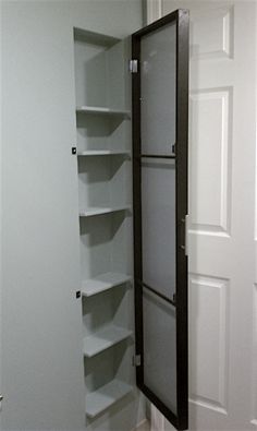 an empty pantry with shelves in it