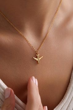 Welcome to the Magical World of PKJewelry Tiny Airplane Pendant Necklace Gold Plated Minimalist Airplane Pendants Necklace is perfect as a special gift for her. This travel necklace is a great choice as a gift for Mother's Day, Birthday, Anniversary, Valentines Day, Christmas. Our high quality products are specially prepared for you with great care. The gold plating on it is much thicker than other platings. Therefore, it is a nice gift to be used for a long time. Our products do not tarnish and are anti-allergic. - Our chains are sent with 16 inch and 2 inch extension chain. You can adjust it to the size you want. If you want it shorter or longer, please contact us.  All Our Travel Necklace  https://www.etsy.com/shop/PKJewelryNecklace?ref=shop-header-name&listing_id=1794870106&from_page=l Airplane Pendant, Plane Necklace, Travel Necklace, Special Gifts For Her, Travel Lover, Gold Pendant Necklace, Elegant Jewelry, Birthday Anniversary, Mother Day Gifts