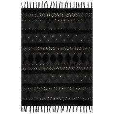 a black and gold rug with fringes on it