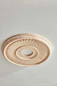 a ceiling light with a circular design on it