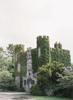 an old castle with ivy growing all over it