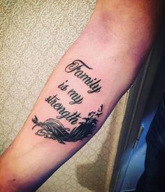 a person with a tattoo on their arm that says, family is my favorite place