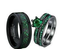 two wedding rings with green stones on each one and the other in black gold or silver