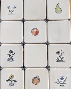 several different types of tile with flowers and fruit on them