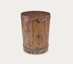 a wooden barrel with metal straps on the bottom