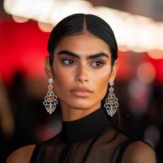 a close up of a person wearing earrings