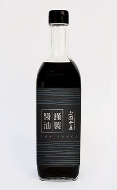 a bottle of soy sauce on a white background