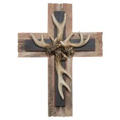 a wooden cross with deer antlers on it