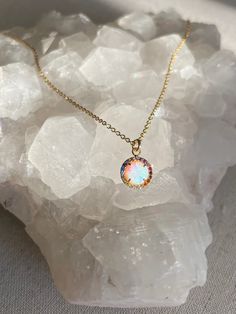 Elevate your look with our stunning White Halo Kyocera Opal Necklace! This ethereal piece features a mesmerizing opal stone that will surely turn heads. Perfect for any occasion! Nickel & Lead free14k Gold Plated Pendant & 18" L Gold Plated Chain Opal Stone, Elevate Your Look, Opal Necklace, White Opal, Gold Plated Chains, Opal Jewelry, Halo, Opal, Gold Plate