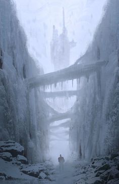 a man walking down a snow covered road in the middle of winter with ice hanging from it's sides