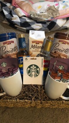 the starbucks coffee gift basket is full of goodies and other things to put in it