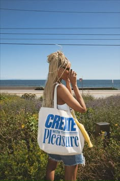 We made a tote that will carry everything you need to have a cute and creative day. Whether you're getting groceries, going to school, or walking around with just your headphones...it's creative 💙 Heavy canvas tote with squared off bottom Long 23" handles, perfect for shoulder carrying 20"W x 15"H x 5"D Reinforced at stress points, intended to last FAQs + Policies Cute Merch Ideas, Company Merchandise Ideas, Cool Merch Ideas, Brand Merchandise Ideas, Tote Bag Graphic Design, Acai Shop, Merch Ideas Products, Tote Bag Photography, Branded Merch