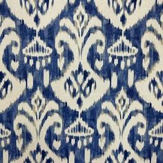 a blue and white pattern on fabric