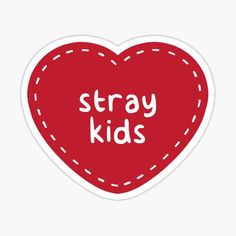 a red heart sticker with the words stray kids written on it in white lettering