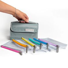 Multi pouch: multi-purpose - one case for all! Grab and go storage: six cute, zippered pouches plus one carrying case with extra storage the possibilities are endless. Made of rip-stop water-resistant plastic that is both stylish and durable, they are great for pencils, school supplies, cosmetics, tools, or desk organizers. Multi-storage – six zippered pouches with Velcro bottoms that can attach to the carrying case for on-the-go ease. Carrying case is made of Polyester and clear PVC. It can hol Multi Pouch, Zippered Pouches, Plastic Pouch, All The Small Things, Organized Packing, Desk Organizers, Fabric Projects, The Pouch, Bag Organization