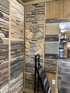 a display case filled with lots of different types of stone tiles and flooring materials