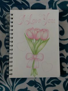 a drawing of pink flowers with the words i love you