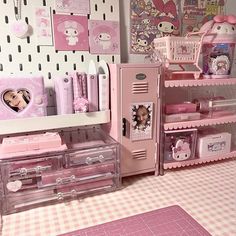 a doll house with pink furniture and accessories