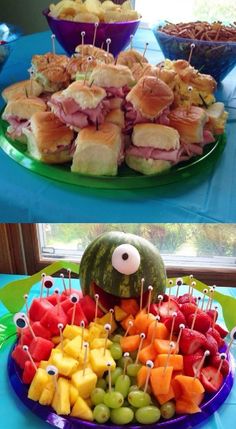 two plates with sandwiches and fruit on them, one has an eyeball in the middle