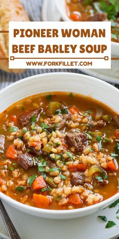 a white bowl filled with beef barley soup