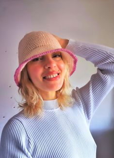 Handmade crochet bucket hat in acrylic yarn in beige color with pink stripe. Comfy and keeps warm. Product size: 54-56см head girth.  Before ordering, please make sure that this item is the right size for you. Color: beige, pink( color discrepancies may occur due to different screen settings). Gender: unisex. Suitable for seasons: warm winter, spring and autumn. Material: acrylic yarn. Product care- machine washable, cool wash-30o, do not iron, do not tumble dry, do not chloride bleach, dry clean. Beige Crochet, Crochet Bucket, Crochet Bucket Hat, Bucket Hats, Spring And Autumn, Pink Stripes, Beige Color, Acrylic Yarn, Keep Warm