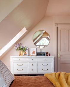 Under the eaves... the most soothing shade of @farrowandball paint, a vintage dresser, and amber tones update this gorgeous Newton Victorian. Design : Build: @milkandhoneygroup Photo: @jessicadelaneyphotography #design #designer #interiors #build #gc #generalcontractor #masterbedroom #brasshardware #bohostyle #farrowandballpaint #settingplaster #newton #project #chasestreet #boston #massachusetts #milkandhoneygroup Farrow And Ball Paint, Vintage Dresser, Victorian Design, Stylish Beds, Vintage Dressers, Minimalist Chic, Space Saving Solutions, Cozy Decor, Boston Massachusetts