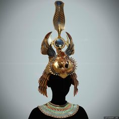 an egyptian headdress is displayed on a mannequin