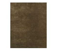 an area rug with dark brown colors