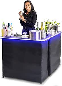 a woman standing behind a bar with bottles on it