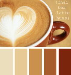 a cup of coffee with a heart drawn on it and the colors are brown, beige, and white