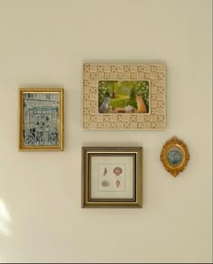 three framed pictures hang on the wall next to each other