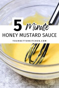 a glass bowl filled with honey mustard sauce and whisk in it, with the words 5 minute honey mustard sauce