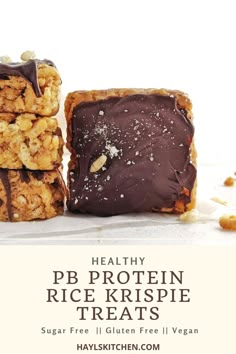 healthy pb protein rice krispie treats with chocolate frosting and nuts on top