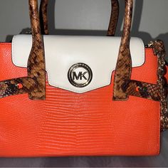 Never Used Designer Orange Bags With Top Carry Handle, Luxury Orange Bags With Top Carry Handle, Designer Orange Satchel Shoulder Bag, Designer Orange Rectangular Bag, Designer Orange Rectangular Bags, Orange Leather Shoulder Bag With Top Carry Handle, Designer Orange Tote Shoulder Bag, Luxury Orange Shoulder Bag With Double Handle, Luxury Orange Crossbody Satchel