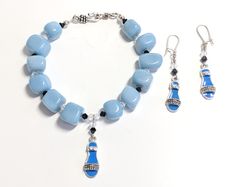 a necklace and earring set with blue beads