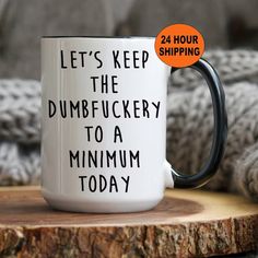 a coffee mug with the words let's keep the dumpfucky to a maximum today on it