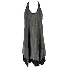 SILENT by DAMIR DOMA tank dress comes in a grey cotton / nylon featuring a black trim, sleeveless, and a layered design. Very Good Pre-Owned Condition. Marked: S Measurements: Bust: 30 inches Length: 39.5 inches Reference: 122950 Category: Dress More Details Brand: DAMIR DOMA Size: S Color: Grey Color 2: Black Fabric: Cotton / Nylon Material: Mixed fabrics Pattern: Wrinkled Style: Tank Age Group: Adult Gender: Female Damir Doma, Layered Design, Mixing Fabrics, Phillip Lim, Grey Cotton, Color 2, Black Trim, Layers Design, Grey Color