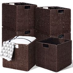 three brown wicker storage baskets stacked on top of each other