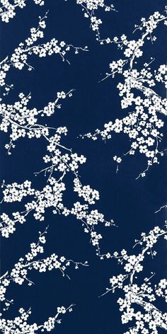 a blue background with white flowers on it