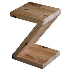 a wooden table with the letter z on it's side and holes in the wood